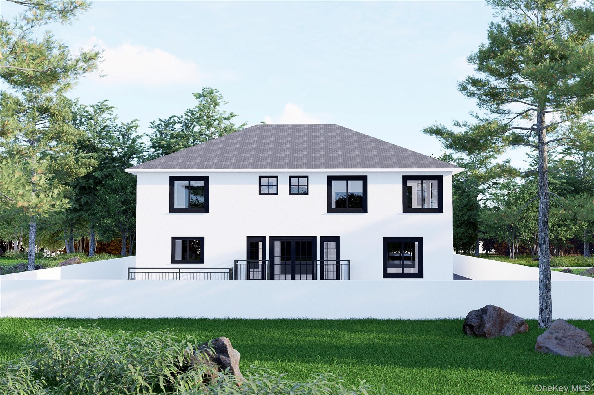 1275 Barry Drive South Valley Stream, NY 11580 - Photo 3 of 4 a front view of a house with a garden and plants