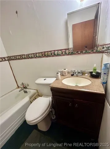 a bathroom with a sink and a toilet