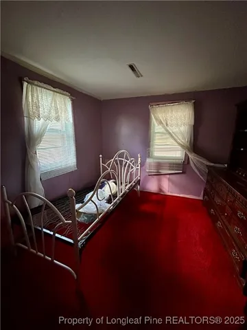 a room with furniture and window