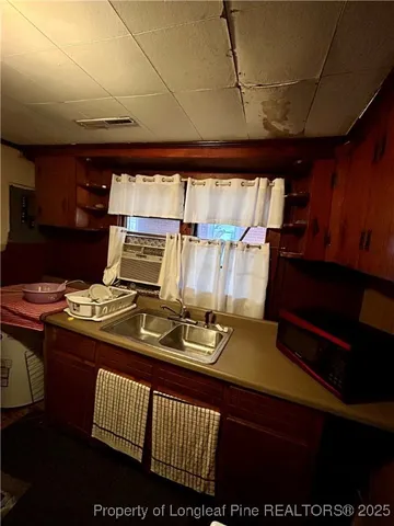 a view of workspace with wooden floor