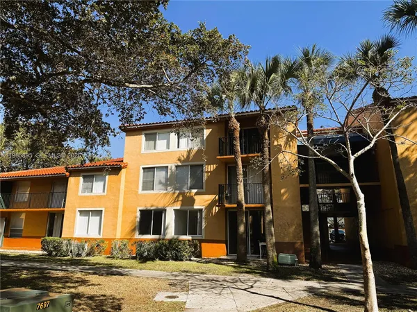 a front view of a house with a ocean view