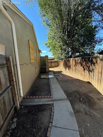 39 Sunflower Road, Unit A Colorado Springs, CO 80907 - Photo 12 of 23 View of yard with a patio