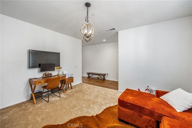 a view of a livingroom with furniture