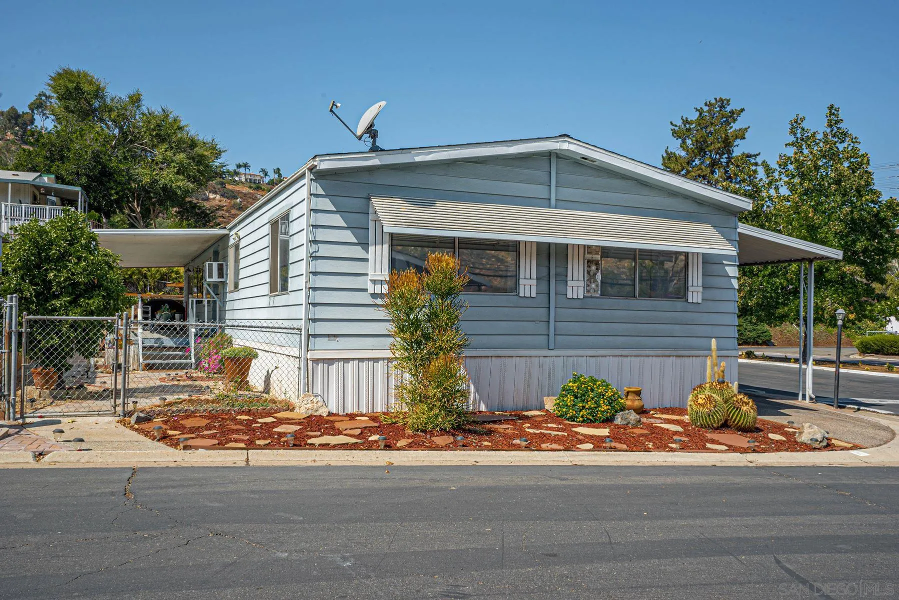 a front view of a house with garage