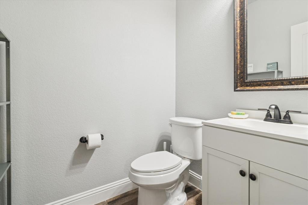 3605 Dogwood Road Melissa, TX 75454 - Photo 16 of 25 a bathroom with a sink and a toilet