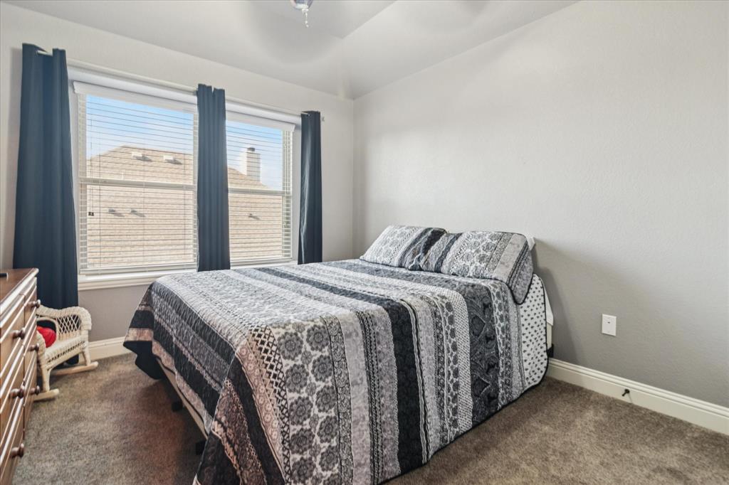 3605 Dogwood Road Melissa, TX 75454 - Photo 18 of 25 a bedroom with a bed and a window