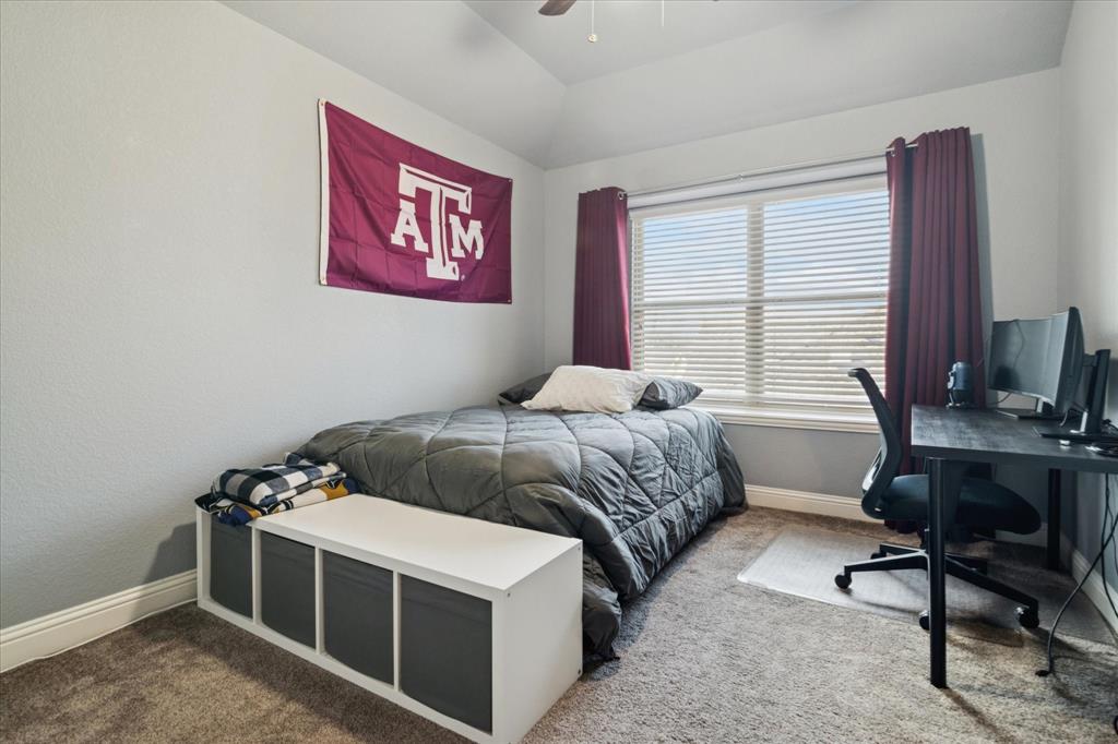 3605 Dogwood Road Melissa, TX 75454 - Photo 20 of 25 a bedroom with a bed and a desk