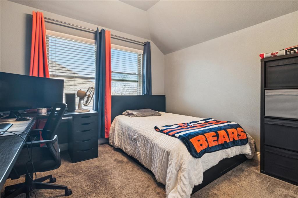 3605 Dogwood Road Melissa, TX 75454 - Photo 21 of 25 a bedroom with a bed and a desk