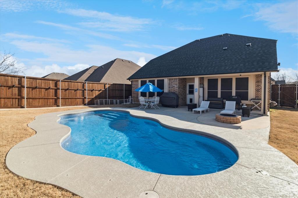 3605 Dogwood Road Melissa, TX 75454 - Photo 23 of 25 a view of a house with swimming pool and porch
