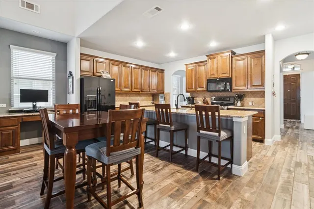 a view of a dining room with furniture