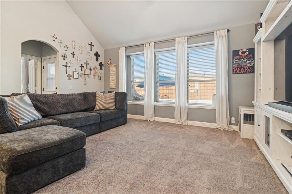 3605 Dogwood Road Melissa, TX 75454 - Photo 8 of 25 a living room with furniture and a fireplace