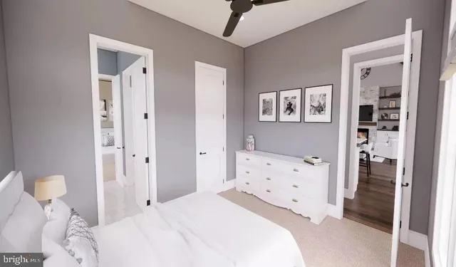 a bedroom with a bed and a cabinets