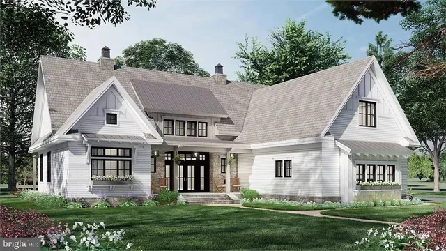 front view of a house with a yard