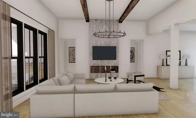 a kitchen with stainless steel appliances kitchen island granite countertop a sink a stove a dining table and chairs