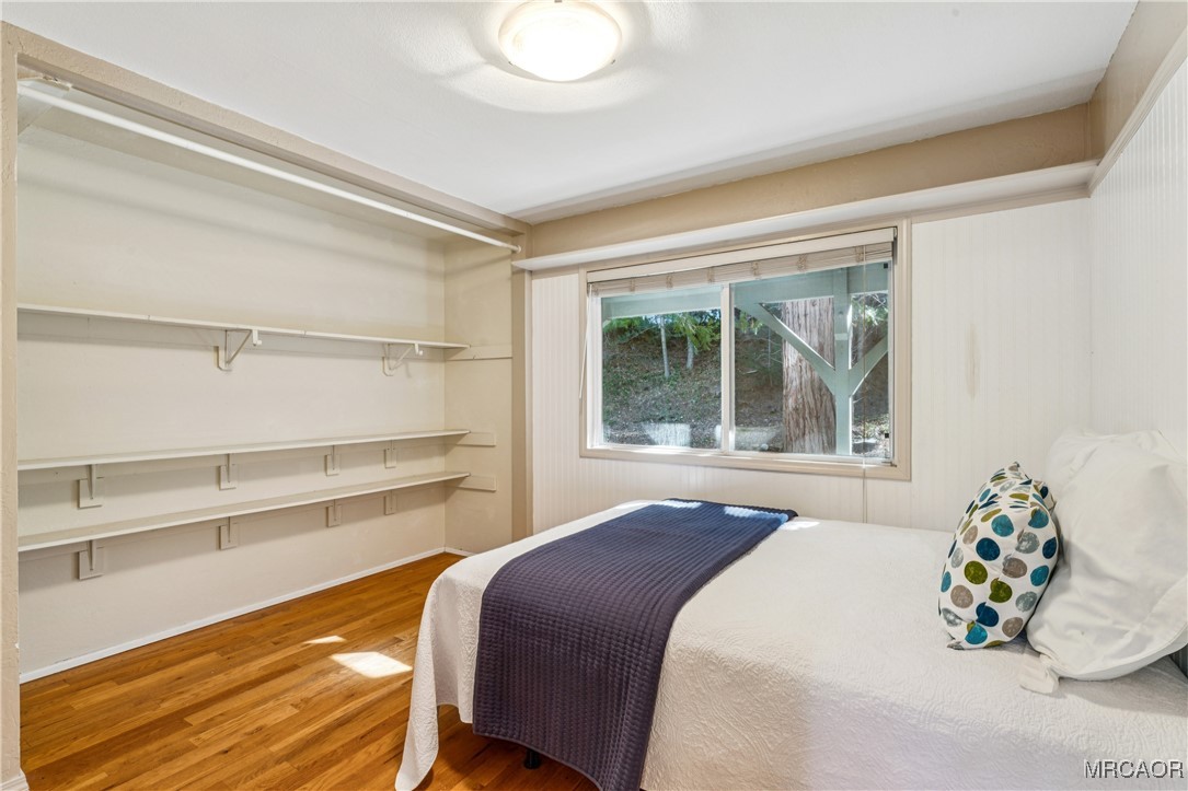 296 Massive Road Lake Arrowhead, CA 92352 - Photo 13 of 43 a bedroom with a bed and a window
