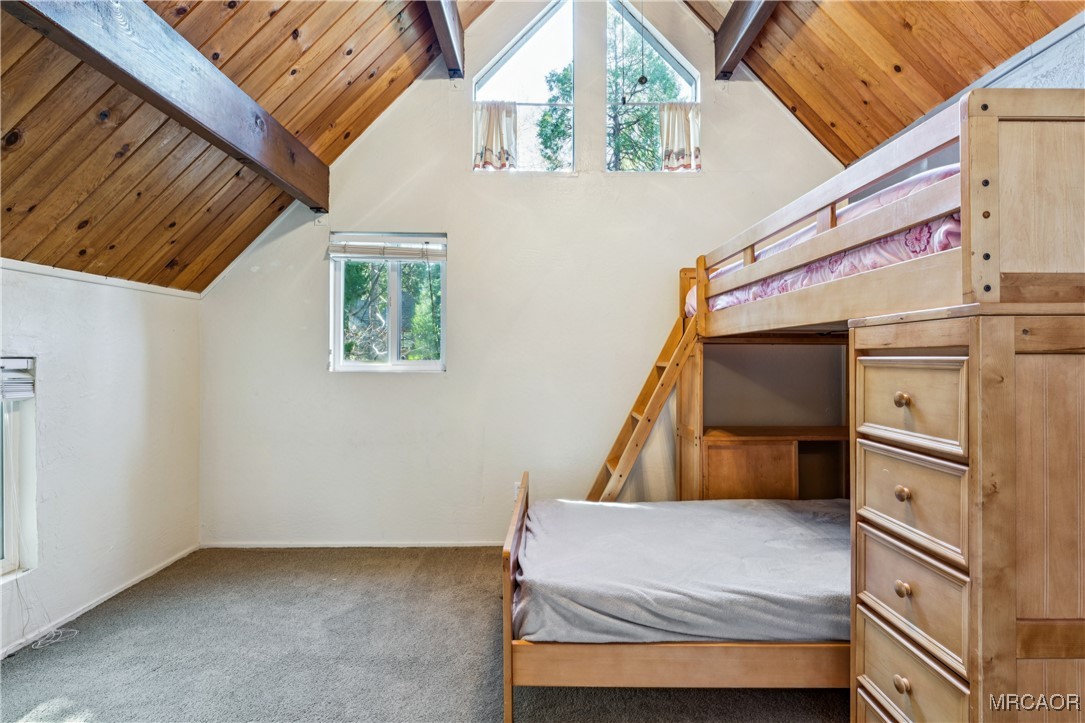296 Massive Road Lake Arrowhead, CA 92352 - Photo 23 of 43 a house with wooden floor and furniture