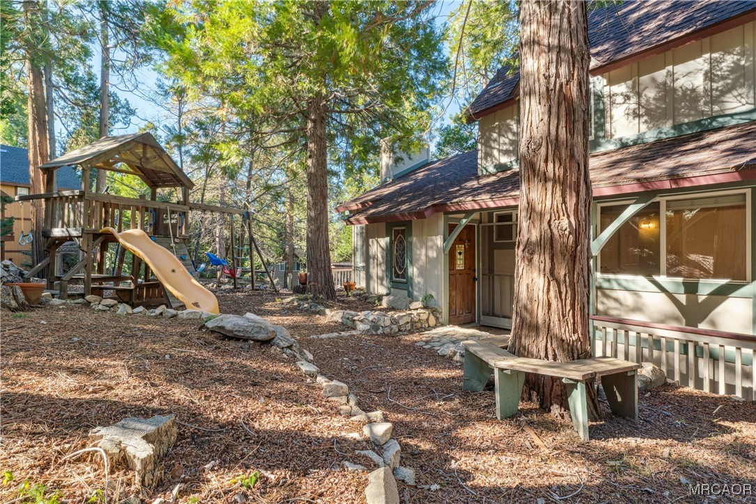 296 Massive Road Lake Arrowhead, CA 92352 - Photo 26 of 43 a view of a house with backyard porch and sitting area