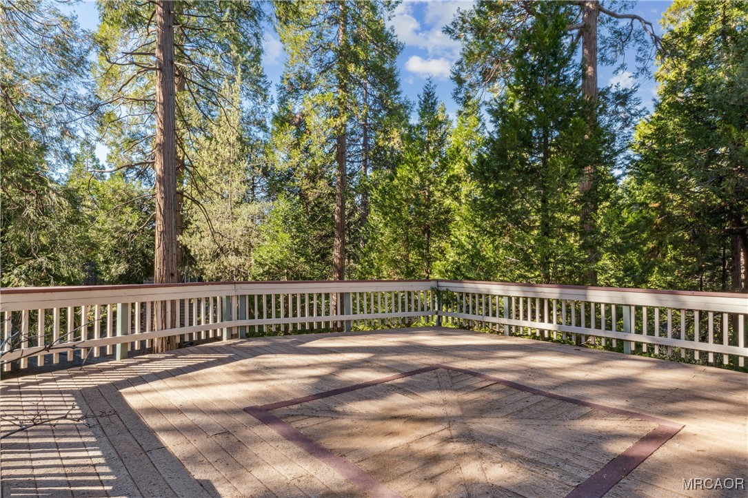 296 Massive Road Lake Arrowhead, CA 92352 - Photo 30 of 43 a view of balcony with wooden floor