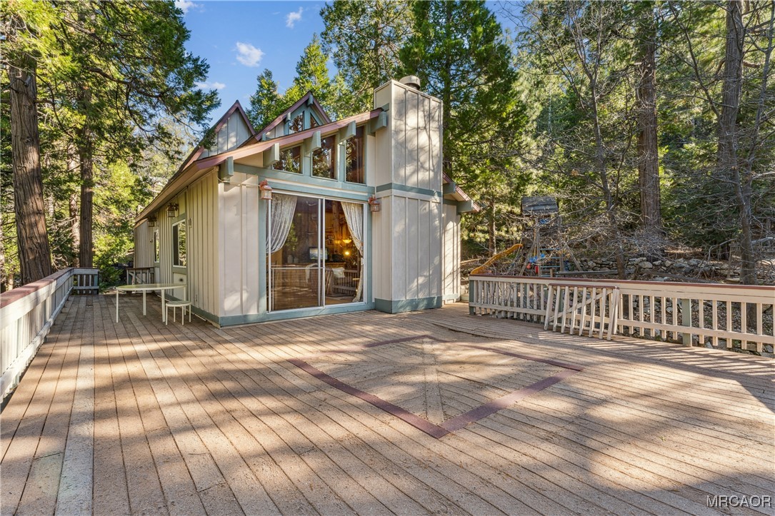 296 Massive Road Lake Arrowhead, CA 92352 - Photo 32 of 43 a view of a house with a patio