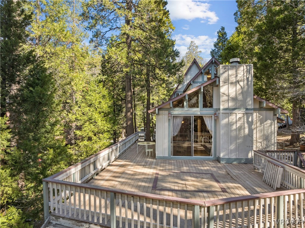 296 Massive Road Lake Arrowhead, CA 92352 - Photo 34 of 43 a view of a house with a iron gate