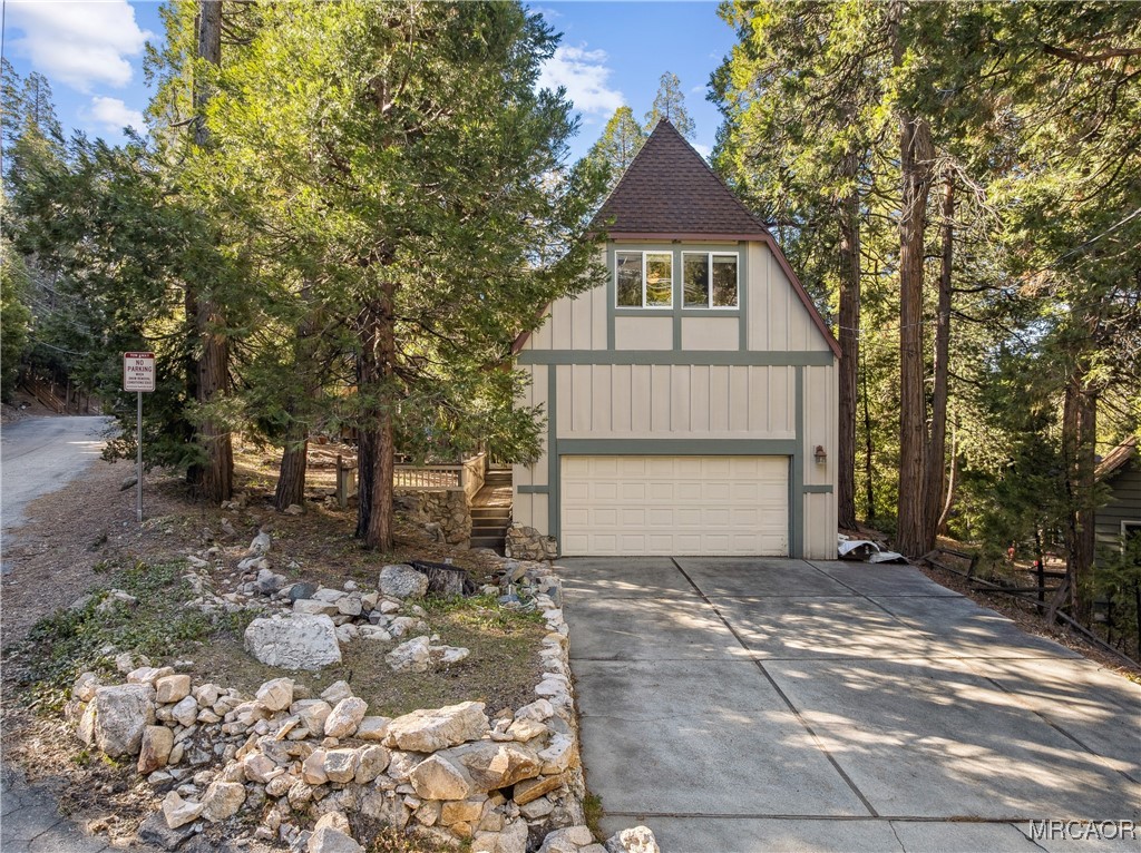 296 Massive Road Lake Arrowhead, CA 92352 - Photo 37 of 43 a front view of a house with a yard