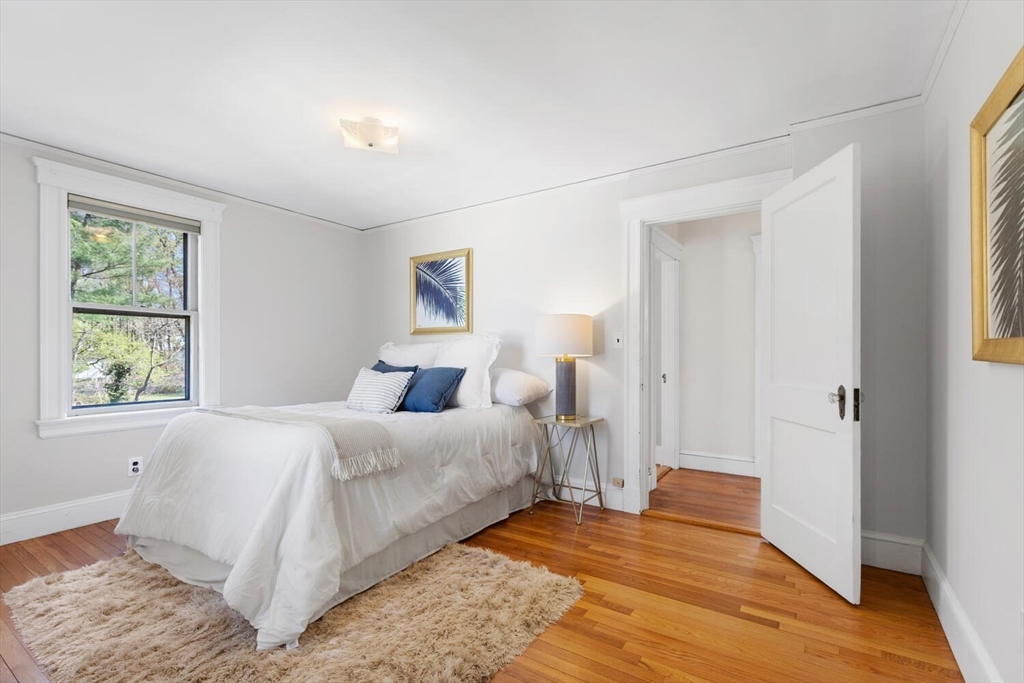 28 Spring Street Lexington, MA 02421 - Photo 16 of 39 a bedroom with a bed and a window