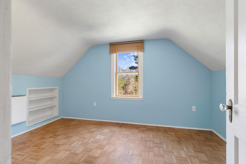 28 Spring Street Lexington, MA 02421 - Photo 28 of 39 a view of an empty room with a window