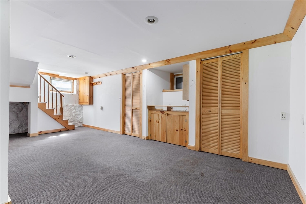 28 Spring Street Lexington, MA 02421 - Photo 30 of 39 a view of empty room with stairs