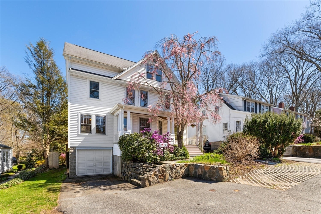28 Spring Street Lexington, MA 02421 - Photo 3 of 39 a front view of a house with garden
