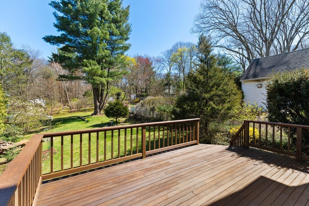 28 Spring Street Lexington, MA 02421 - Photo 32 of 39 a view of balcony with wooden floor and fence