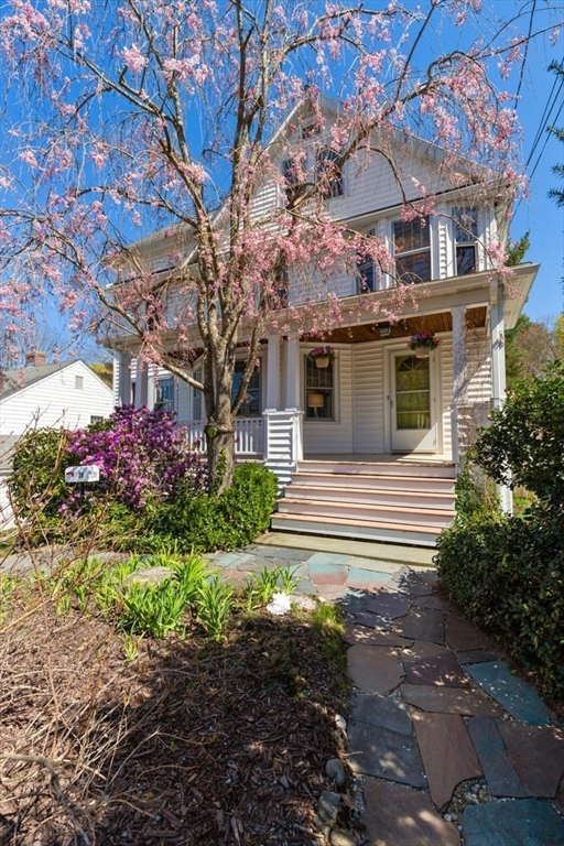 28 Spring Street Lexington, MA 02421 - Photo 4 of 39 a front view of a house with garden