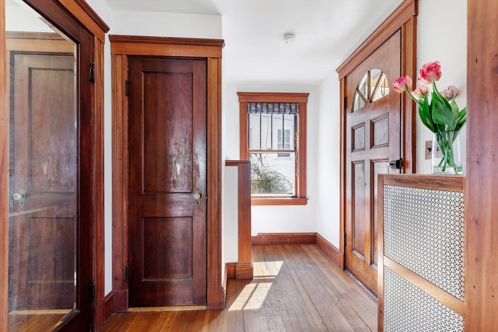 28 Spring Street Lexington, MA 02421 - Photo 5 of 39 a view of livingroom with furniture and wooden floor