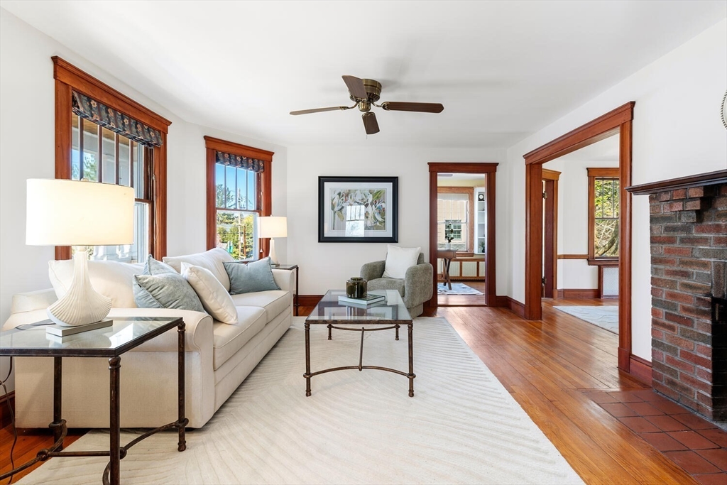 28 Spring Street Lexington, MA 02421 - Photo 6 of 39 a living room with furniture and a window