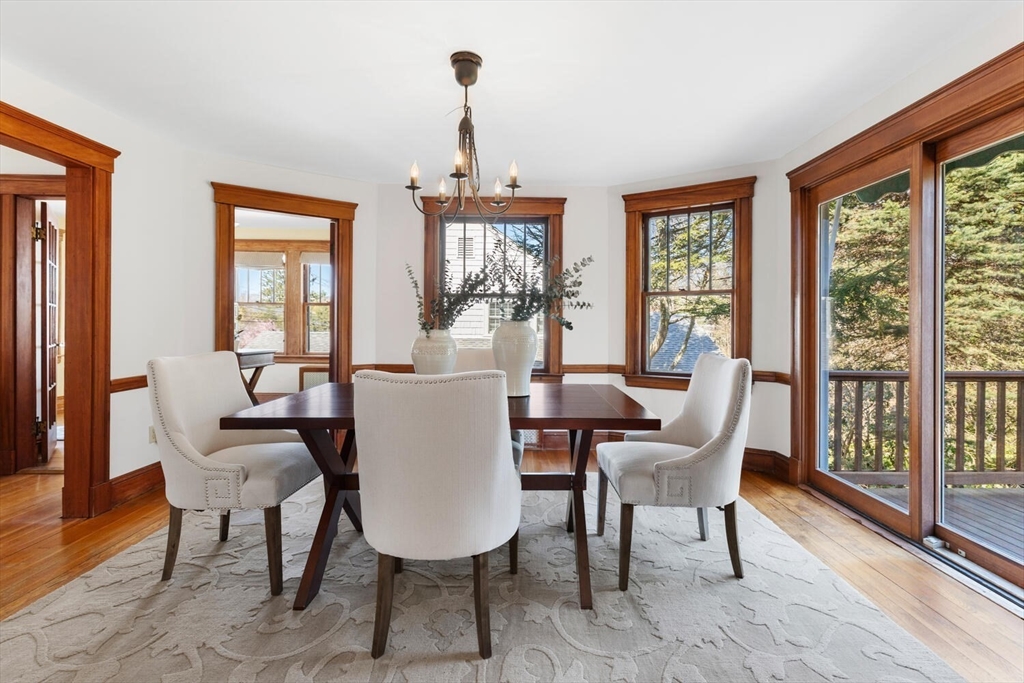 28 Spring Street Lexington, MA 02421 - Photo 10 of 39 a view of a dining room with furniture window and wooden floor