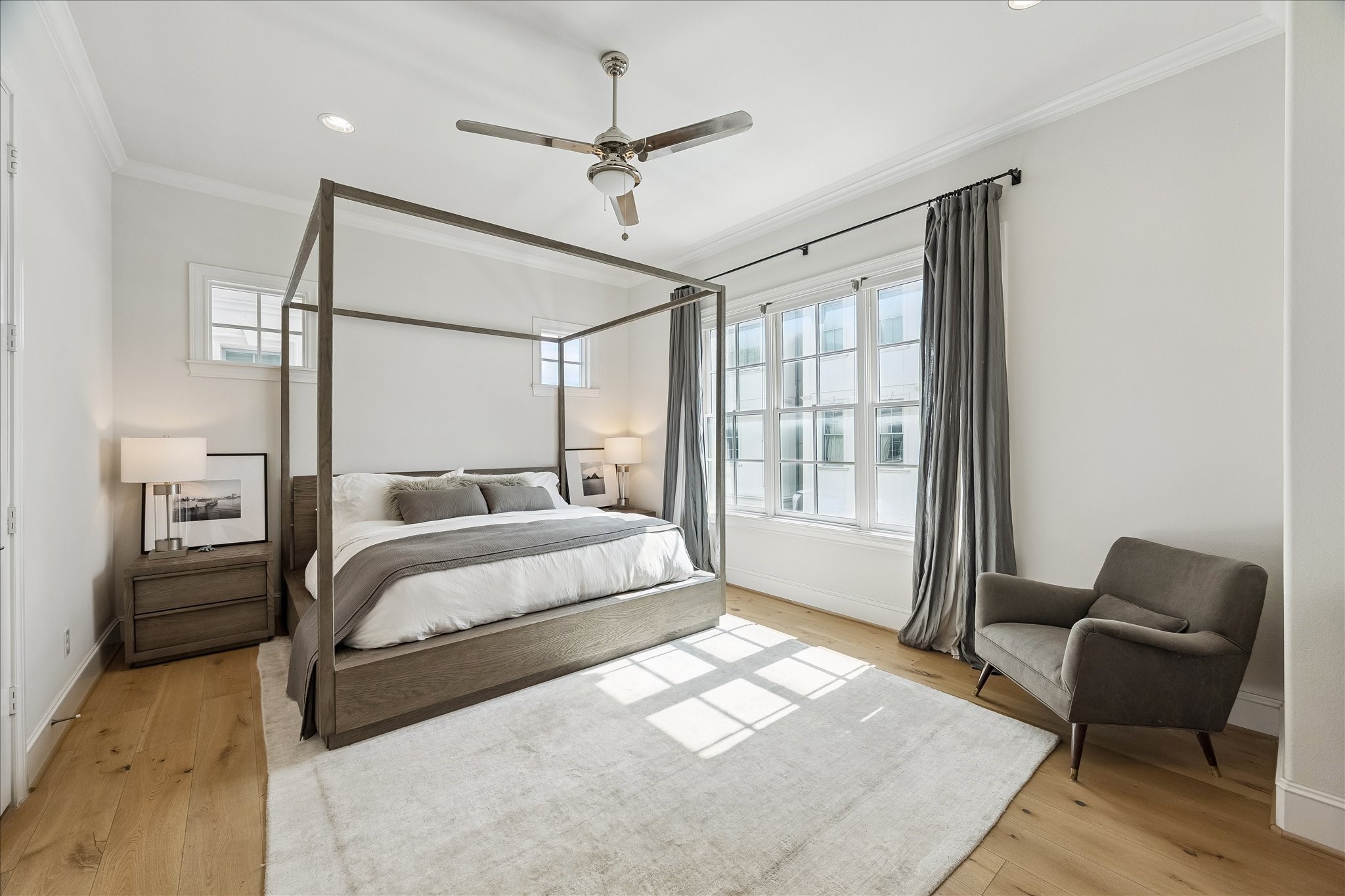 6108 Nicholas Grove Place Houston, TX 77055 - Photo 10 of 29 Upstairs, you'll find the primary bedroom, a bright and airy retreat with plenty of space to relax and unwind.