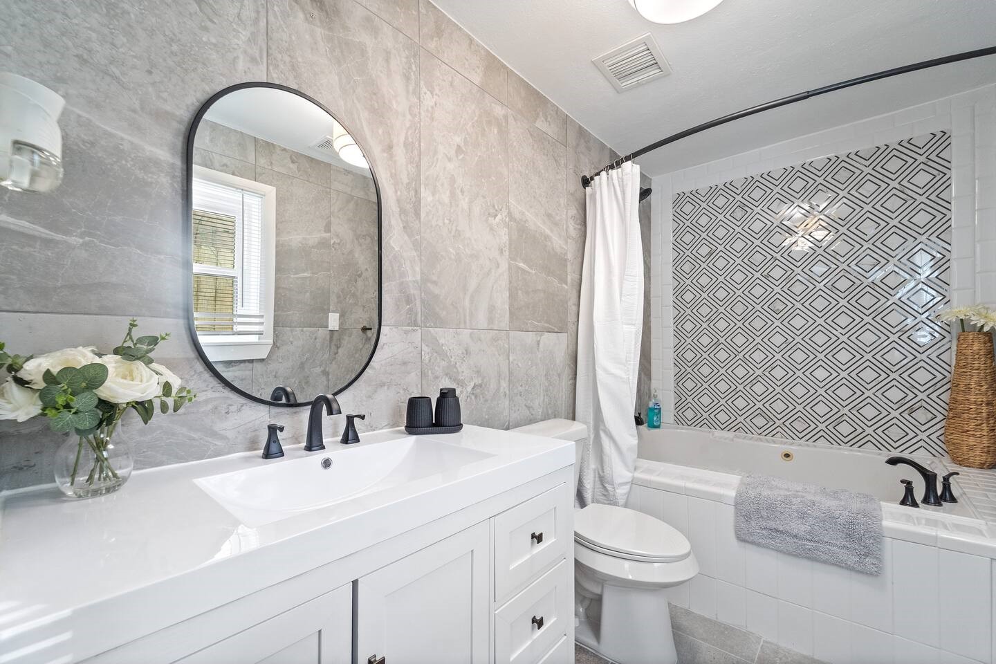 1206 Timber Lane Friendswood, TX 77546 - Photo 13 of 19 a bathroom with a sink and a mirror