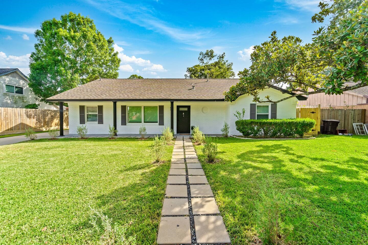 1206 Timber Lane Friendswood, TX 77546 - Photo 19 of 19 a front view of a house with a yard