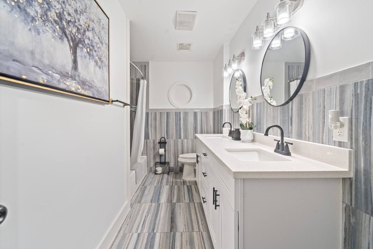 1206 Timber Lane Friendswood, TX 77546 - Photo 3 of 19 a bathroom with a sink and a mirror