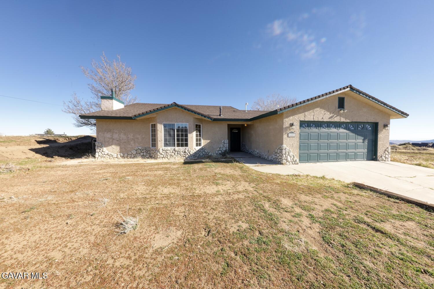 26801 Cabriolet Court Tehachapi, CA 93561 - Photo 4 of 60 a view of a house with a yard