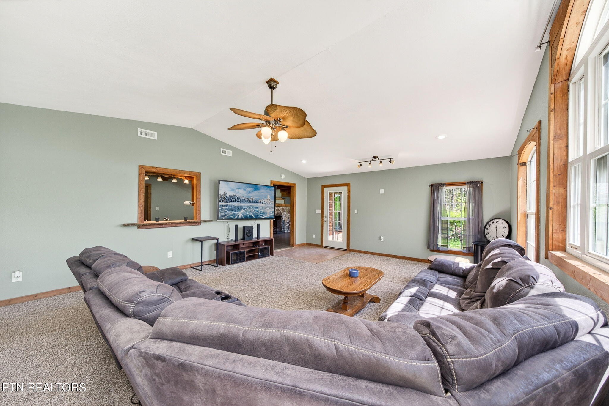 935 Brewer Road Crossville, TN 38572 - Photo 15 of 51 a living room with furniture and a flat screen tv