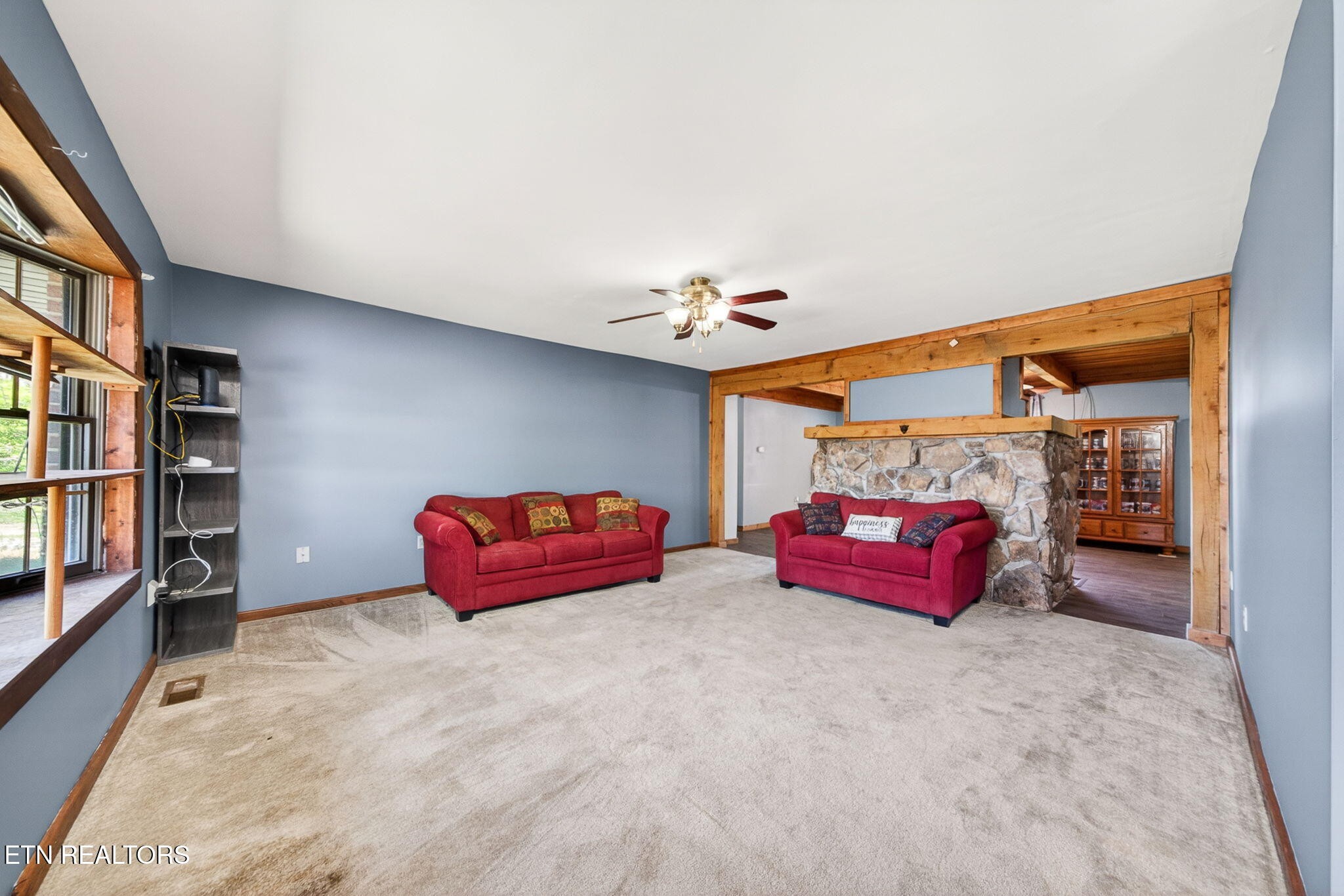 935 Brewer Road Crossville, TN 38572 - Photo 17 of 51 a bedroom with furniture and window