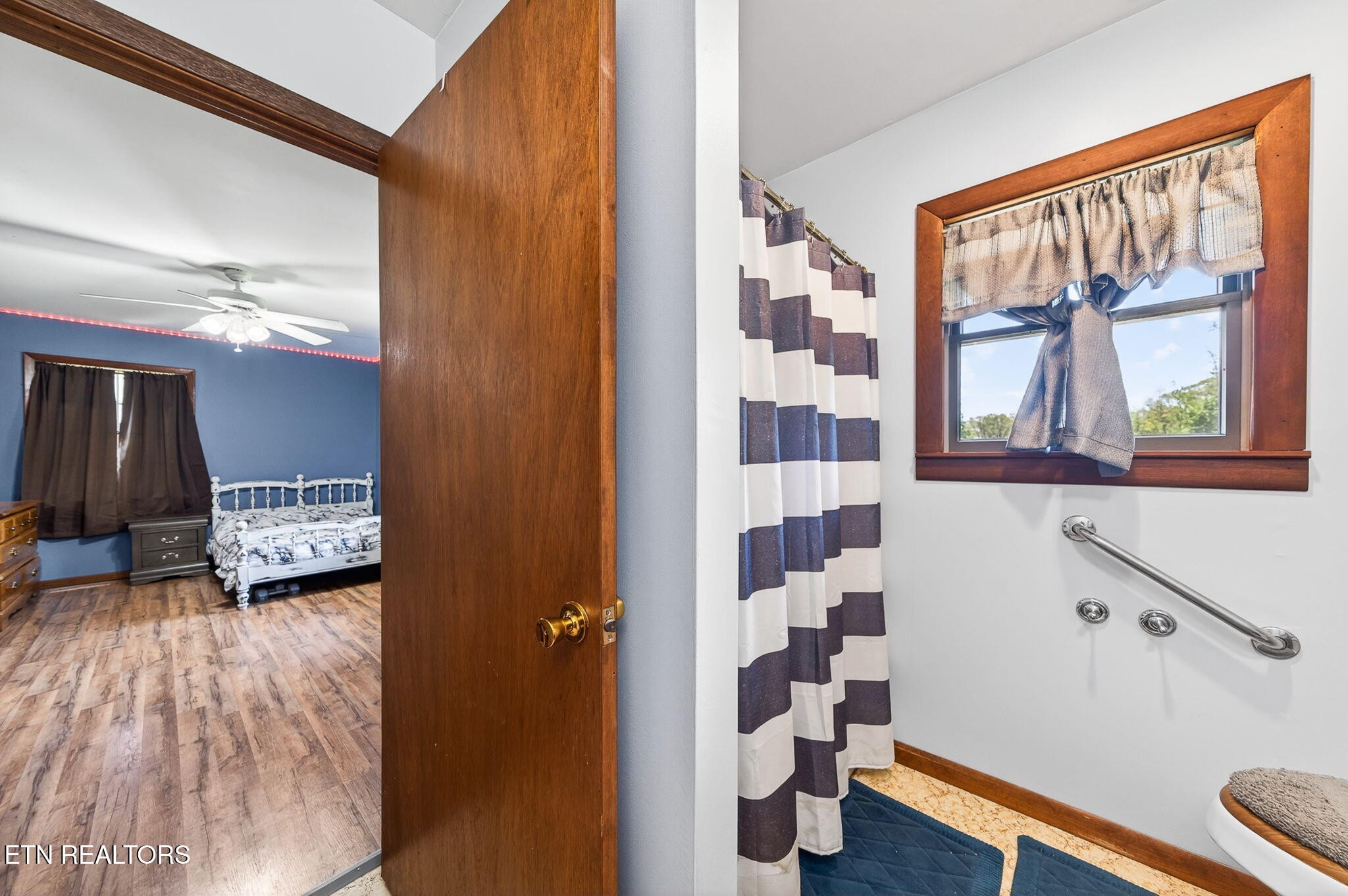 935 Brewer Road Crossville, TN 38572 - Photo 26 of 51 a view of a room with wooden floor and windows