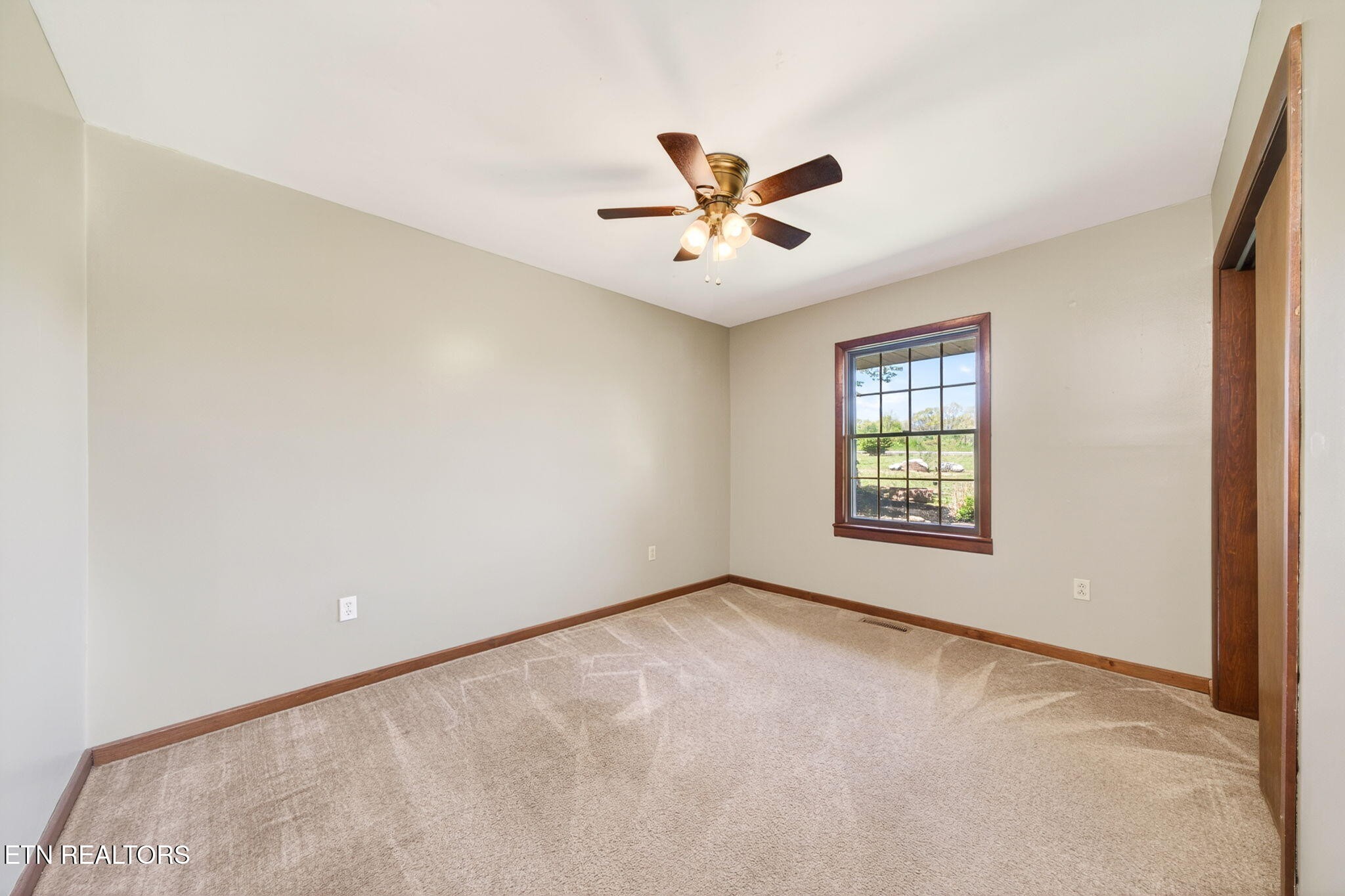 935 Brewer Road Crossville, TN 38572 - Photo 32 of 51 a view of an empty room with a window