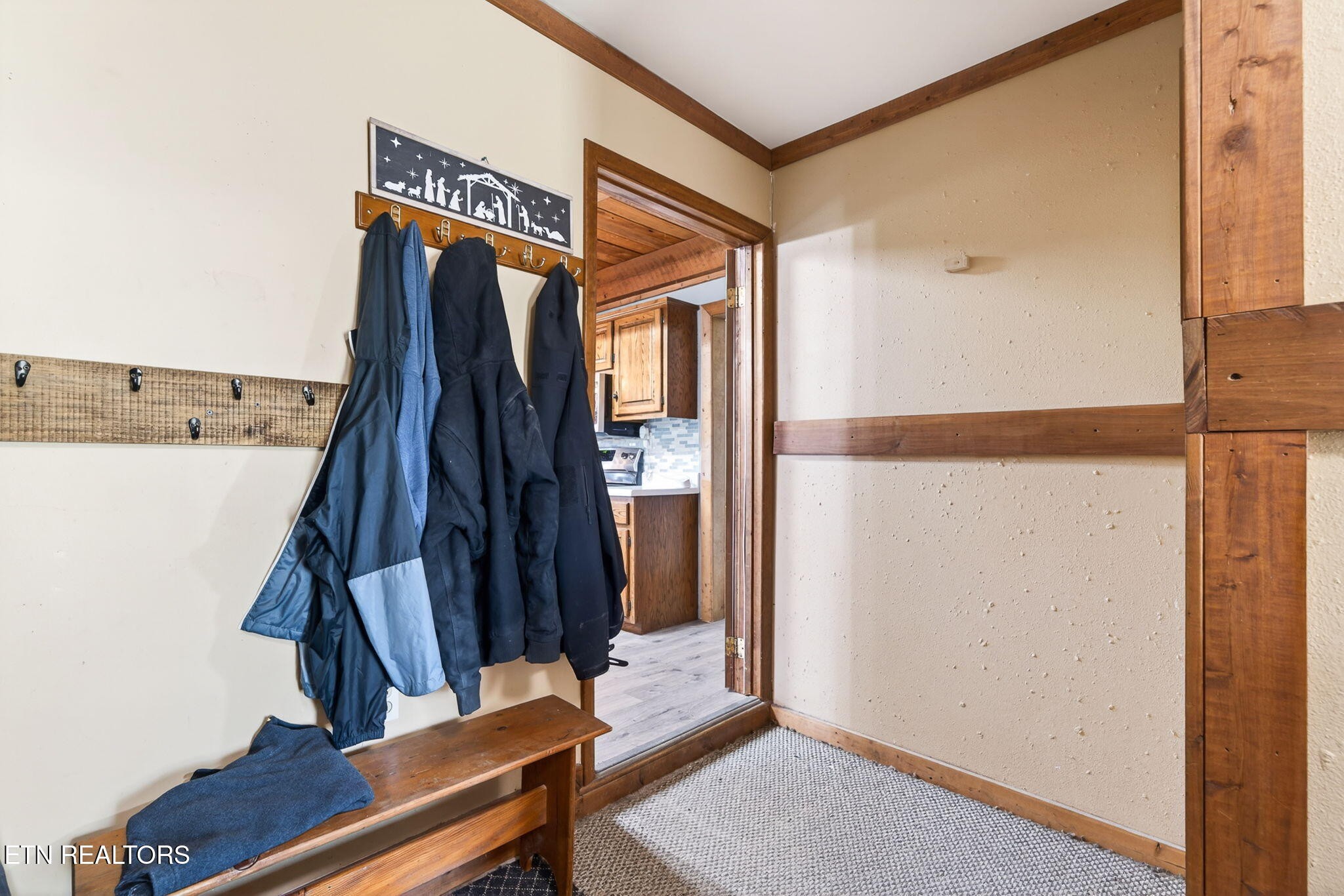 935 Brewer Road Crossville, TN 38572 - Photo 34 of 51 a view of walk in closet with clothes and shoes