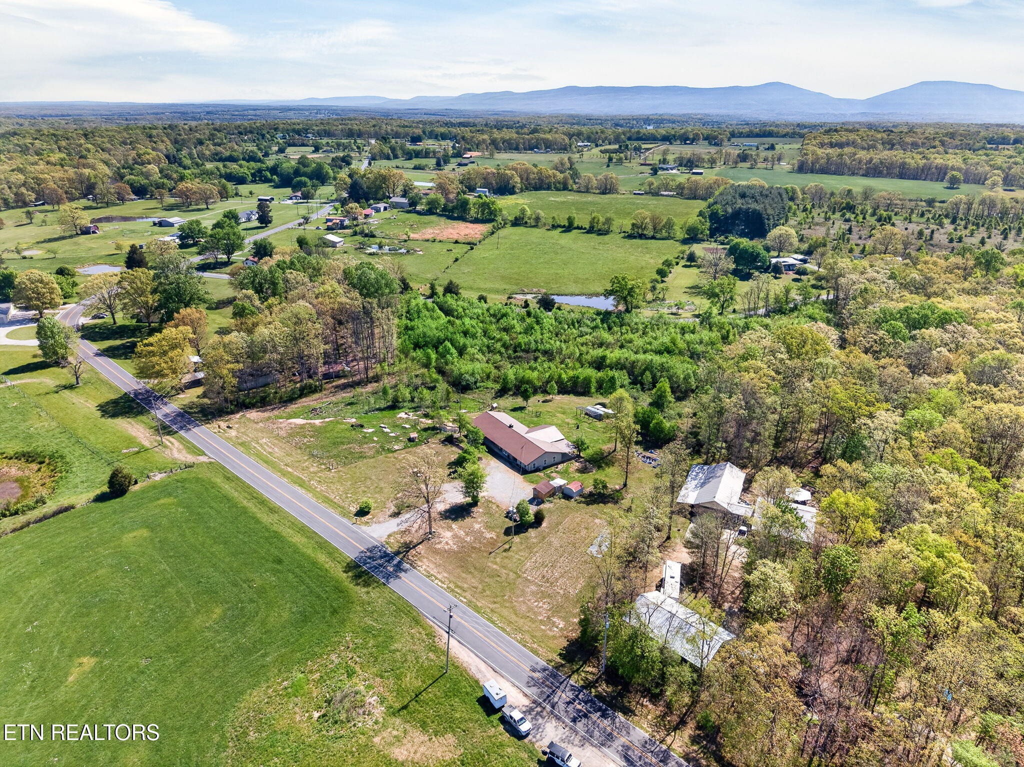 935 Brewer Road Crossville, TN 38572 - Photo 38 of 51 an aerial view of a house with a yard