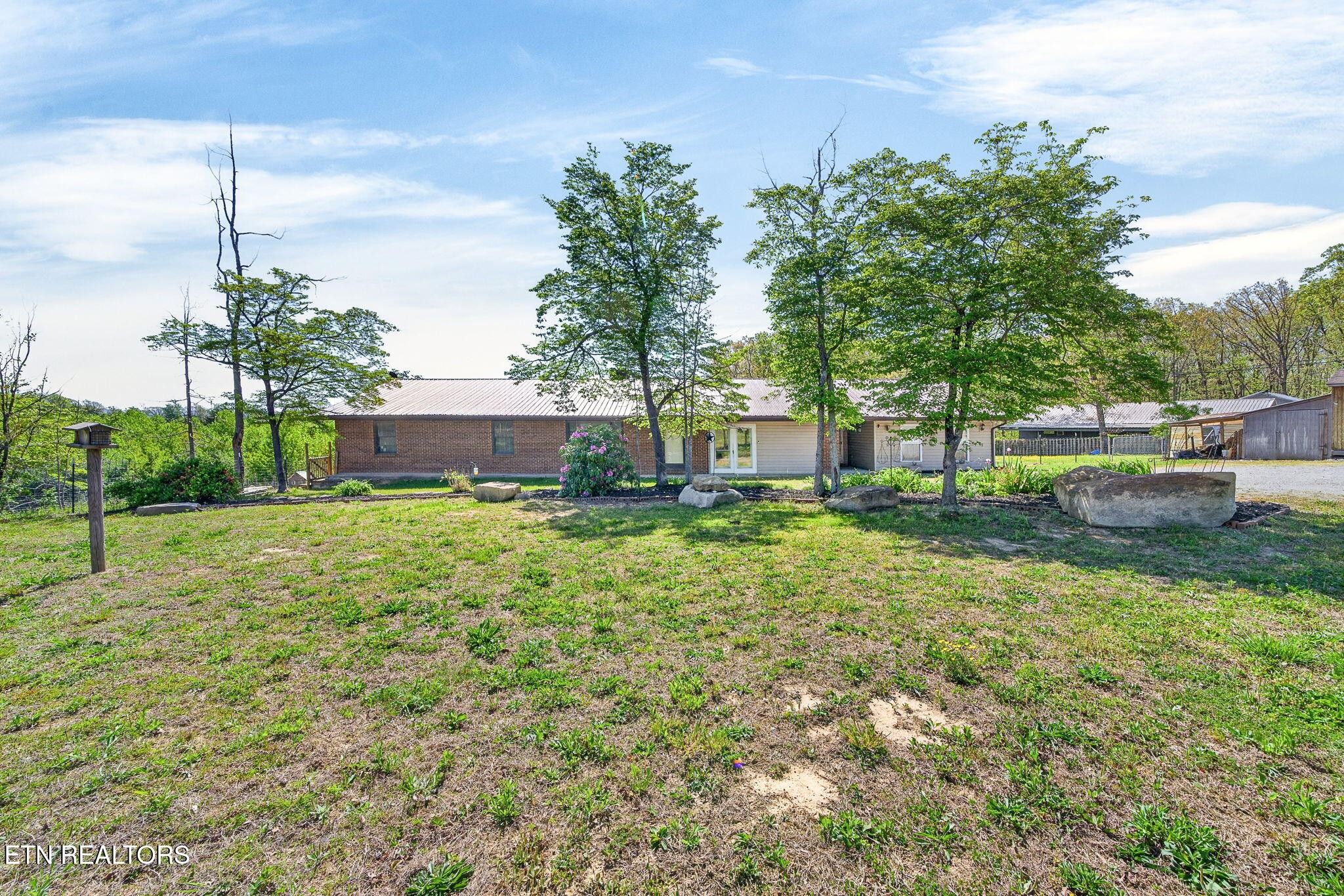 935 Brewer Road Crossville, TN 38572 - Photo 41 of 51 a front view of a house with a yard