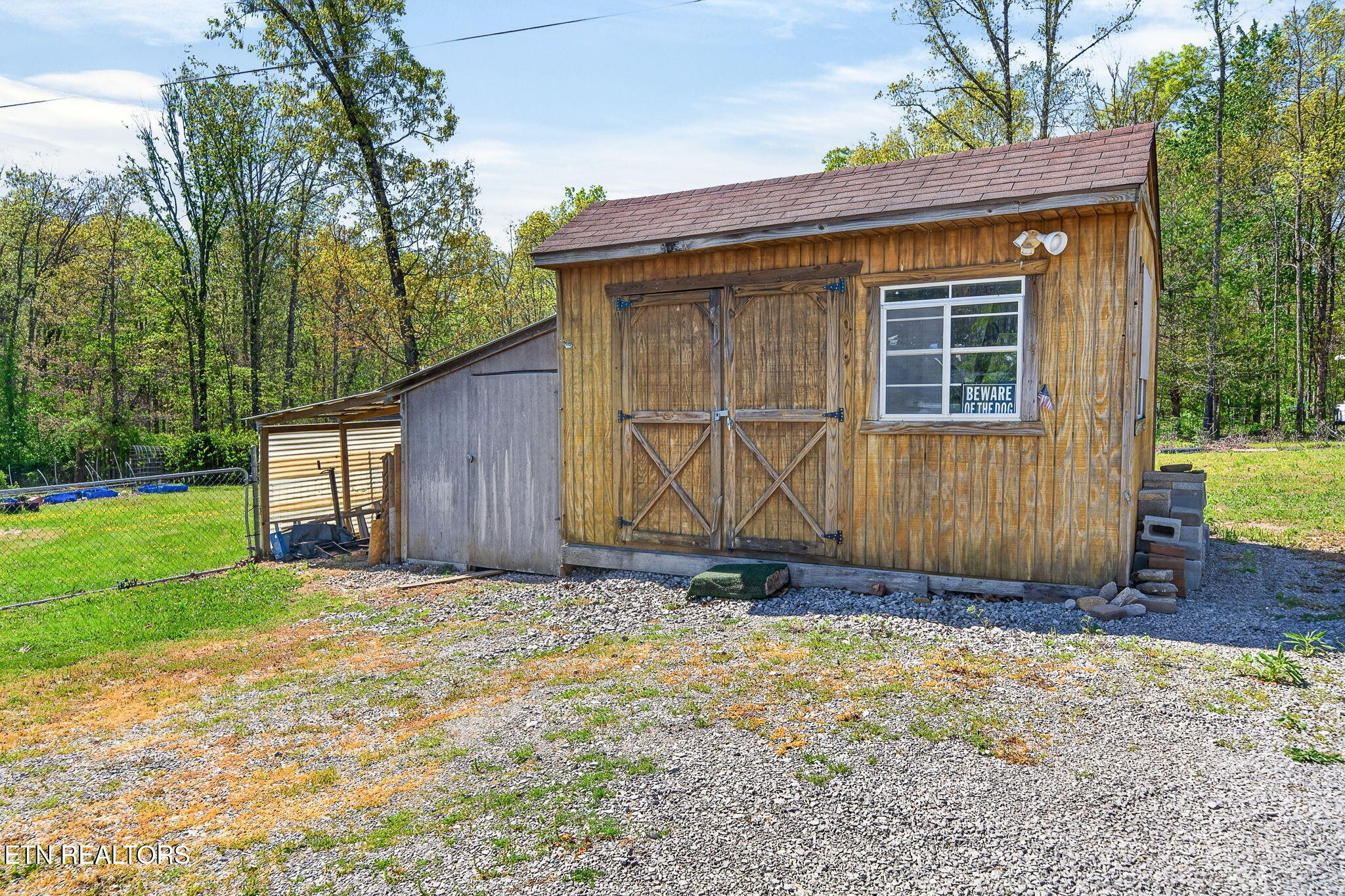 935 Brewer Road Crossville, TN 38572 - Photo 42 of 51 a view of house with backyard and garden