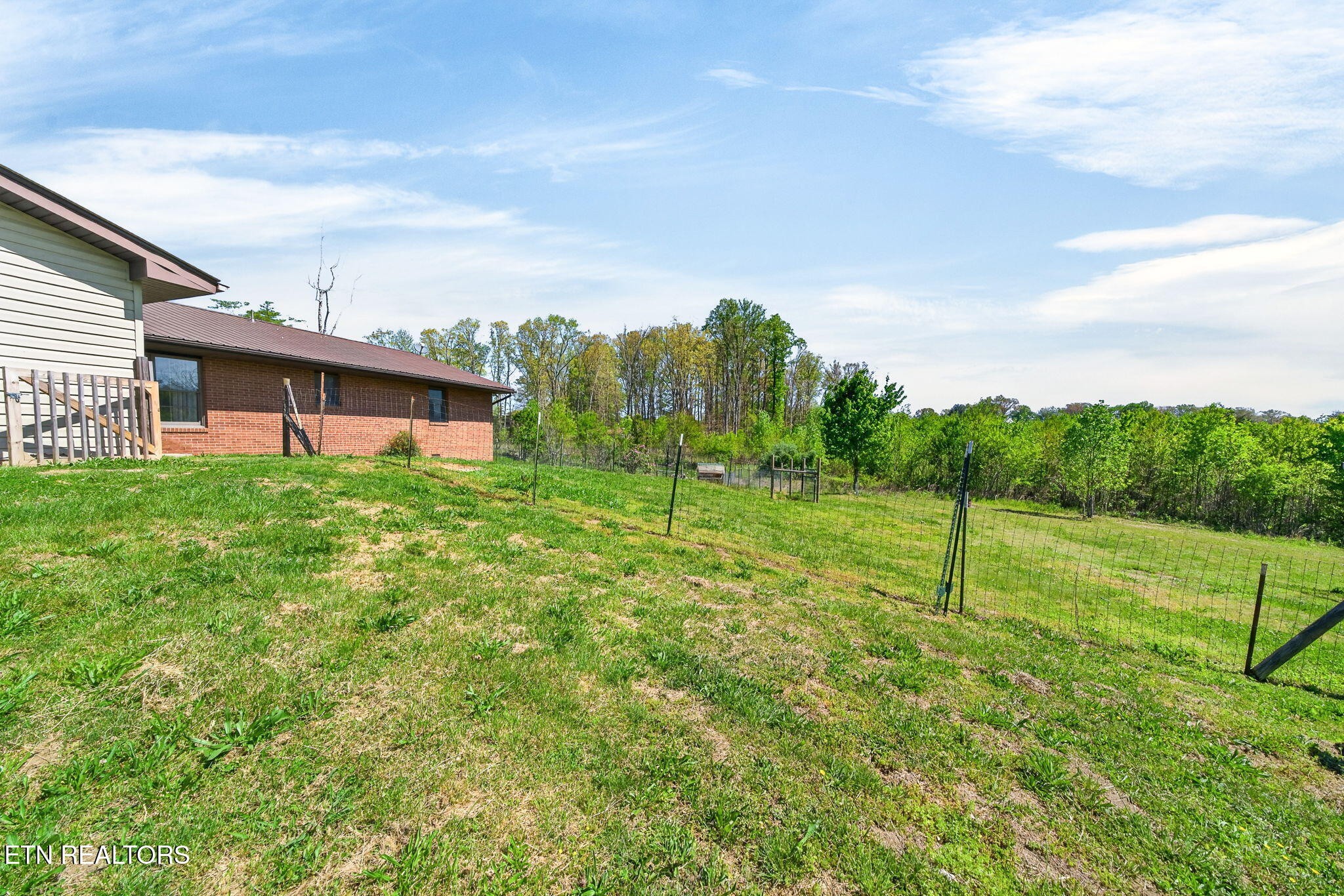 935 Brewer Road Crossville, TN 38572 - Photo 46 of 51 a view of a house with a yard