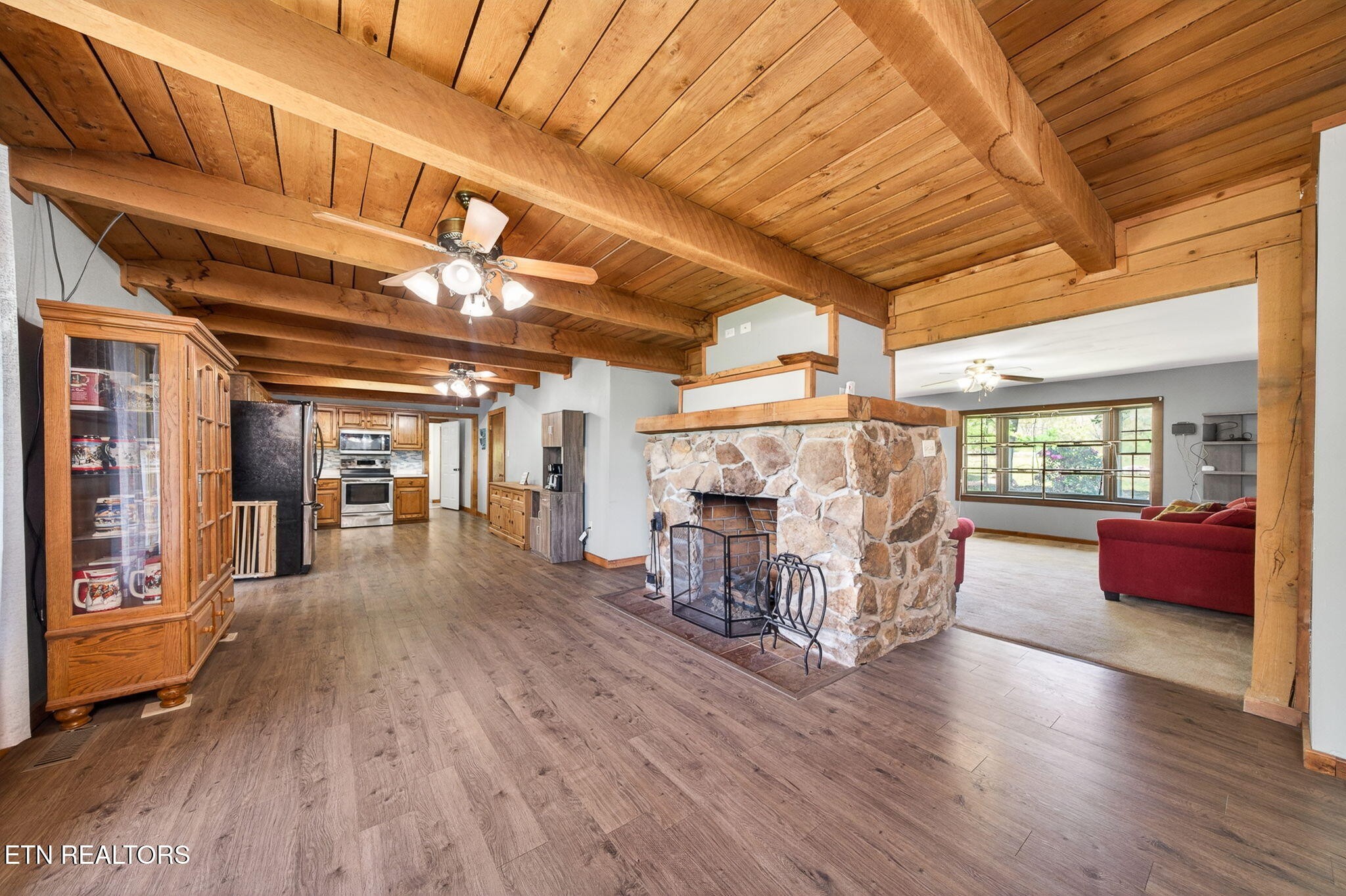 935 Brewer Road Crossville, TN 38572 - Photo 6 of 51 a view of an empty room with wooden floor