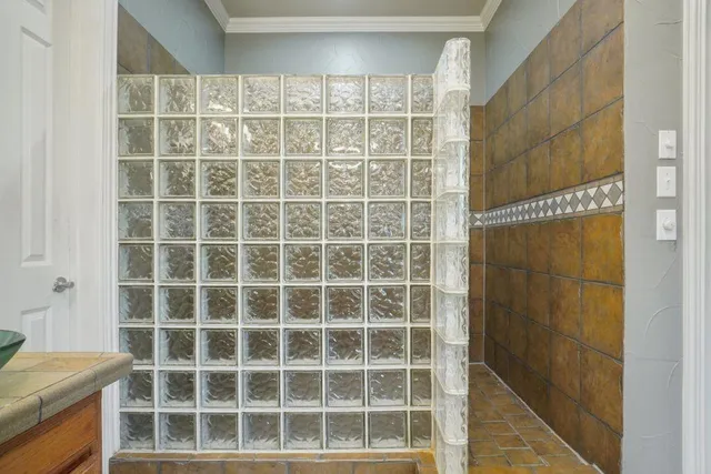 a view of a glass door and a window